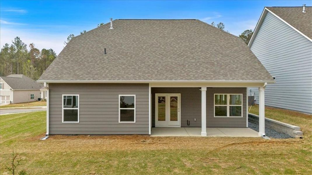 Exterior details and patio area of a home in Stratford at NatureWalk, Dallas (Image 29).
