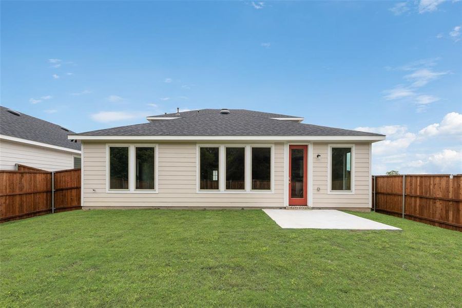 Front exterior of a new home in Creekside of Crowley, Crowley, TX, highlighting curb appeal (Image 15). Front exterior of a new home in Creekside of Crowley, Crowley, TX, highlighting curb appeal (Image 15).