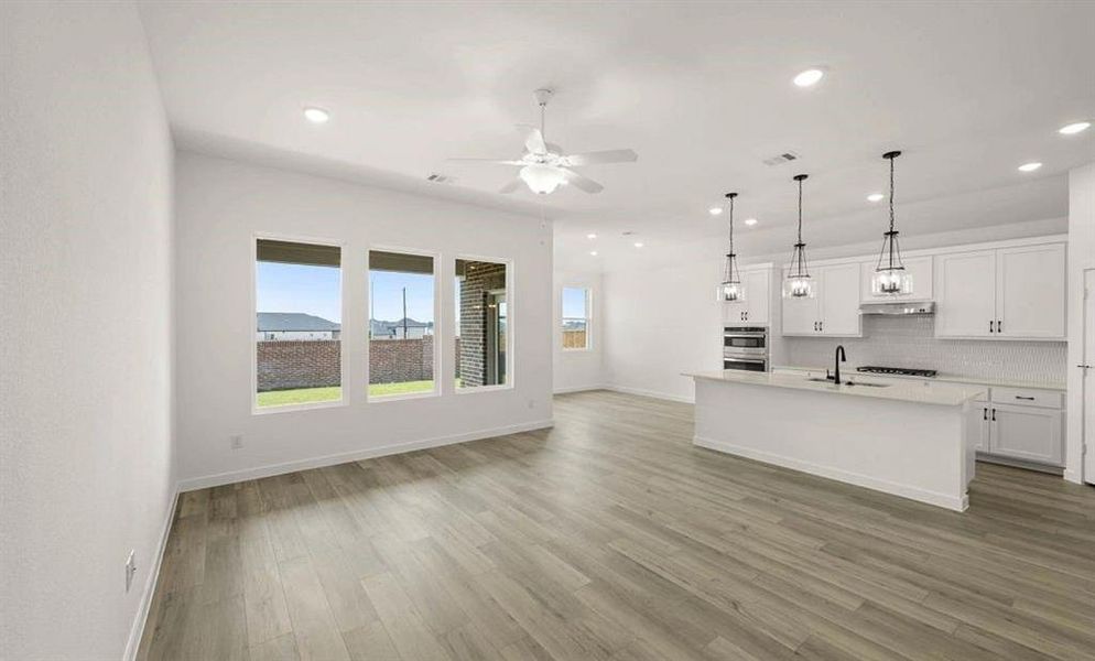 Open Kitchen-Living-Dining Room featuring the Harmony Collection