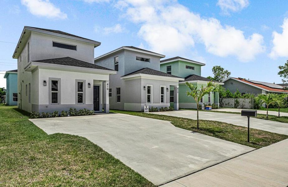 Front exterior of a new home in , Boynton Beach, FL, highlighting curb appeal (Image 19).