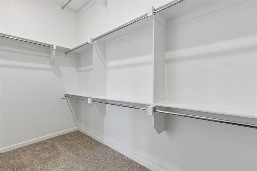 Featuring 3rd row seasonal hanging and tons of space, your dream owner's closet awaits!