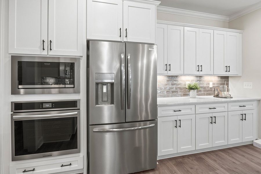 Representative furnished interior of a home built from the The Hampton by RobuckHomes in Kennebec Crossing, Angier (Image 26).
