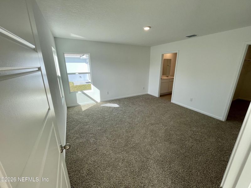 Spacious, unfurnished interior of a new home in Grand Reserve, Bunnell (Image 25).