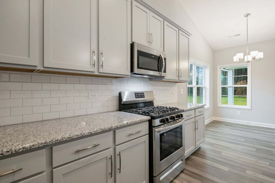 Representative furnished interior of a home built from the Garland by Caviness & Cates Communities in Bartlett Manor, Youngsville (Image 195). Representative furnished interior of a home built from the Garland by Caviness & Cates Communities in Bartlett Manor, Youngsville (Image 195).