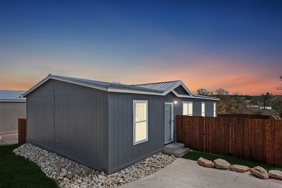 Exterior details and patio area of a home in , Granbury (Image 19).