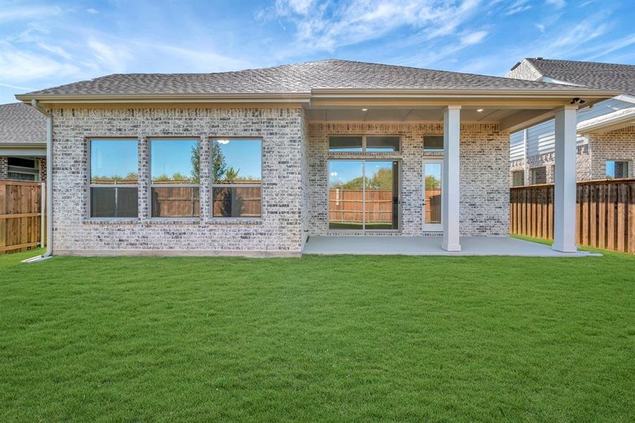 Exterior details and patio area of a home in South Pointe Cottage Series, Mansfield (Image 3). Exterior details and patio area of a home in South Pointe Cottage Series, Mansfield (Image 3).