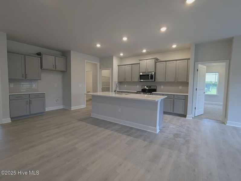 Furnished interior view inside a new home in Hidden Lake Estates, Greenville (Image 5).