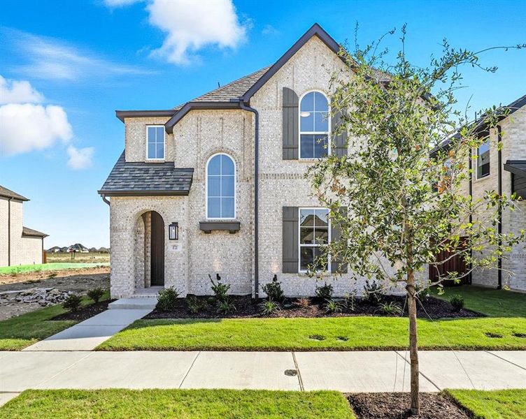 Front exterior of a new home in Wellington: 40ft. lots, Haslet, TX, highlighting curb appeal (Image 2).