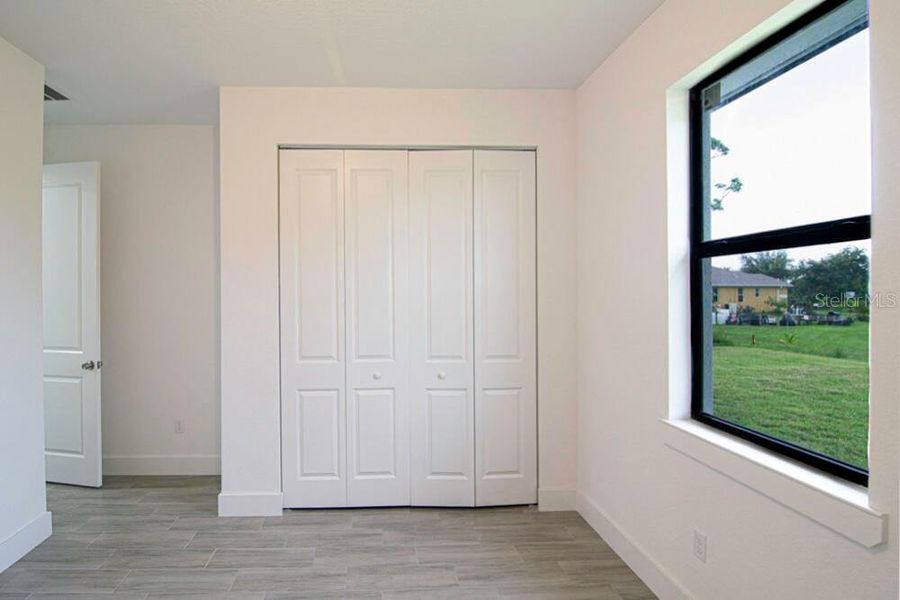 Spacious, unfurnished interior of a new home in , Port Charlotte (Image 19).