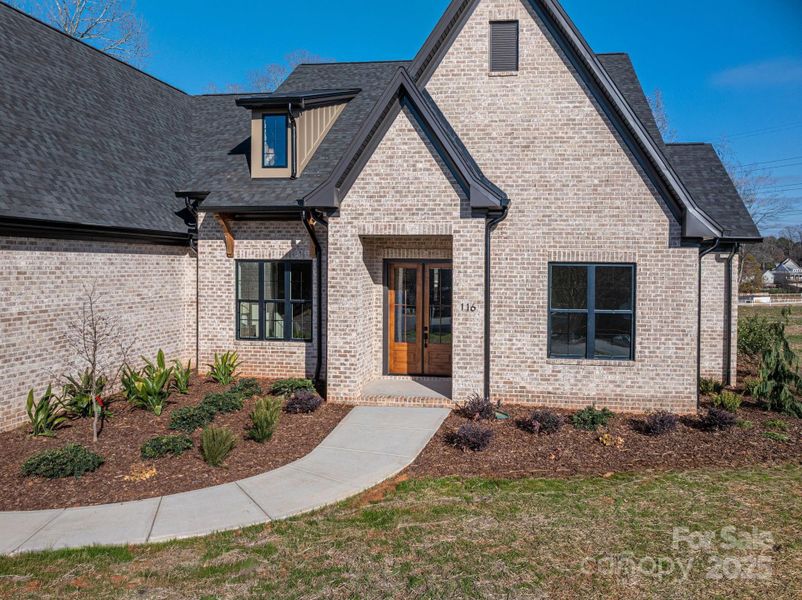 Exterior details and patio area of a home in , Belmont (Image 26).