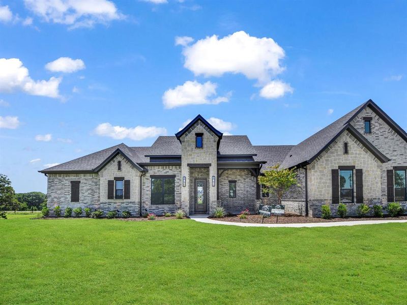 Front exterior of a new home in , Decatur, TX, highlighting curb appeal (Image 24). Front exterior of a new home in , Decatur, TX, highlighting curb appeal (Image 24).