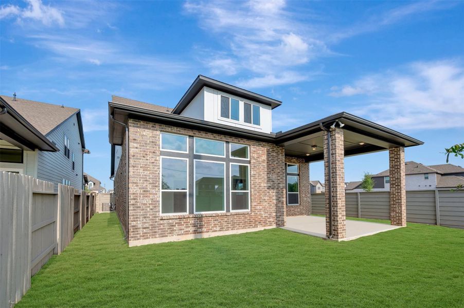 Exterior details and patio area of a home in Pomona - Reserve Collection, Manvel (Image 24). Exterior details and patio area of a home in Pomona - Reserve Collection, Manvel (Image 24).
