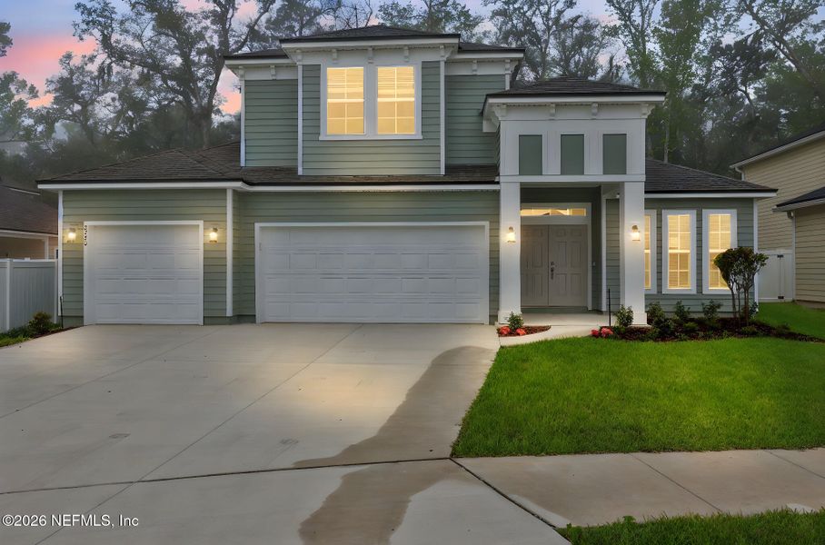 Front exterior of a new home in Jennings Farm, Middleburg, FL, highlighting curb appeal (Image 1). Front exterior of a new home in Jennings Farm, Middleburg, FL, highlighting curb appeal (Image 1).