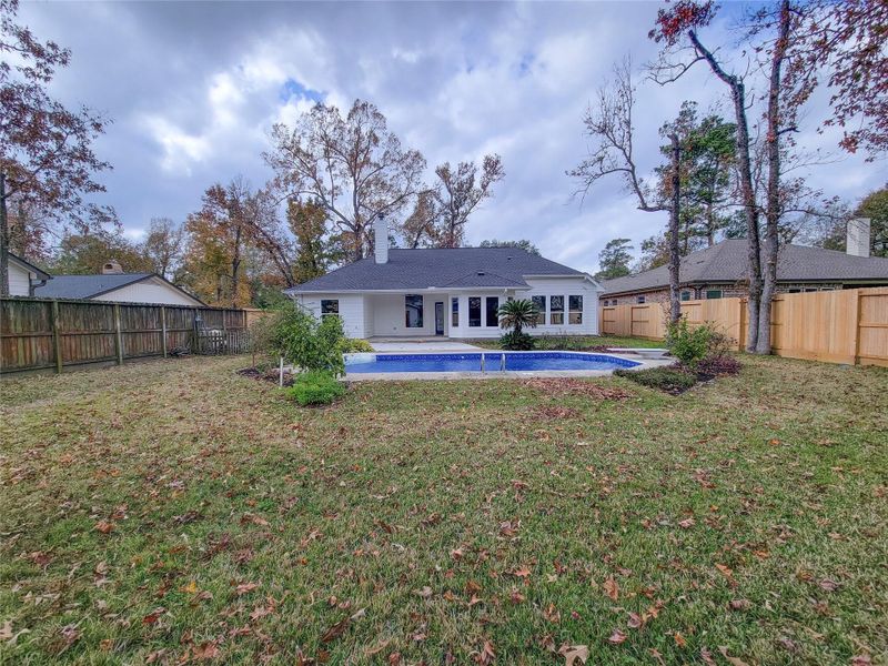Exterior details and patio area of a home in , Conroe (Image 30).