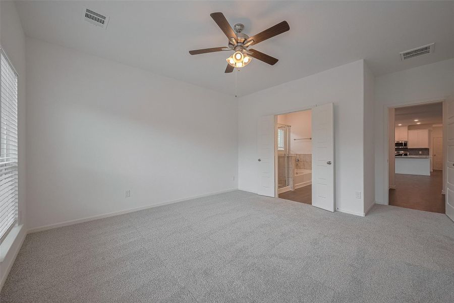 Spacious, unfurnished interior of a new home in Mill Creek Trails, Magnolia (Image 22).