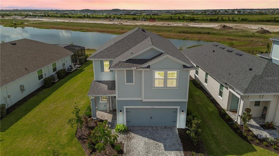 Front exterior of a new home in , Punta Gorda, FL, highlighting curb appeal (Image 1). Front exterior of a new home in , Punta Gorda, FL, highlighting curb appeal (Image 1).