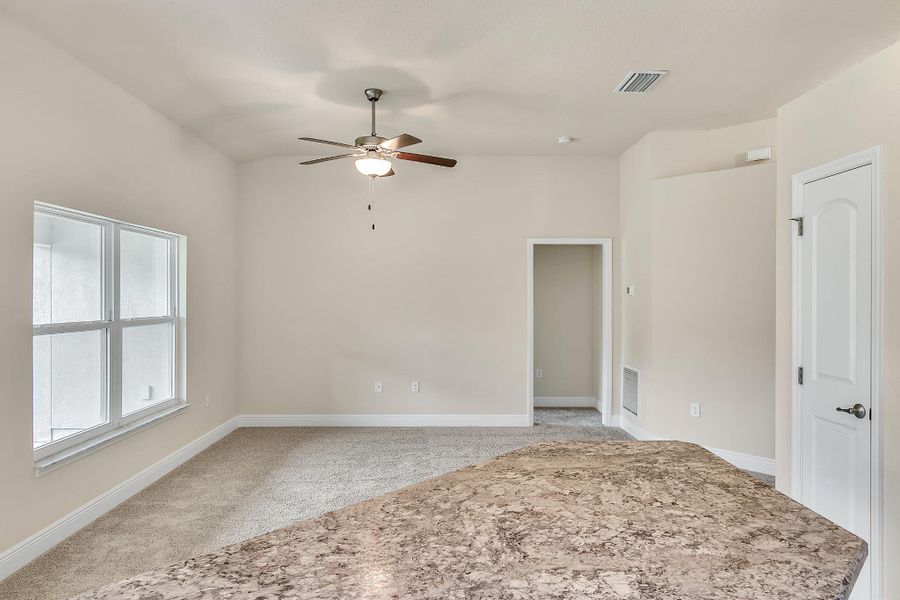 Representative unfurnished interior of a home built from the 1512 by Adams Homes in Winding Oaks, Weeki Wachee (Image 13). Representative unfurnished interior of a home built from the 1512 by Adams Homes in Winding Oaks, Weeki Wachee (Image 13).