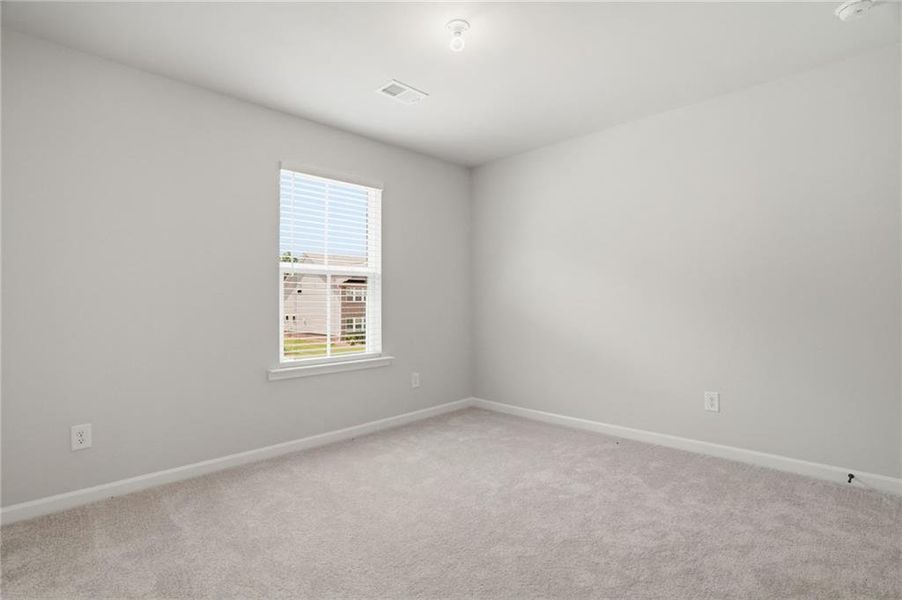 Spacious, unfurnished interior of a new home in Berkeley Mill, Cumming (Image 31).