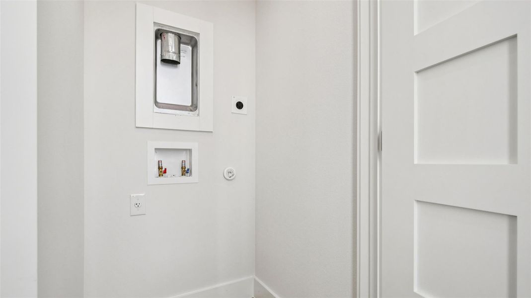 Laundry area featuring washer hookup and electric dryer hookup Laundry area featuring washer hookup and electric dryer hookup