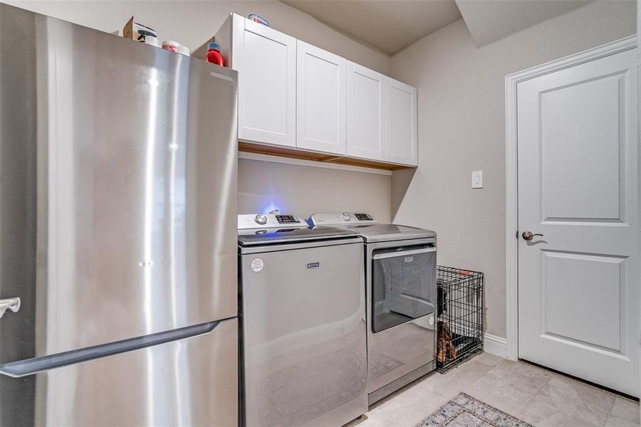 Laundry room featuring washing machine and dryer Laundry room featuring washing machine and dryer