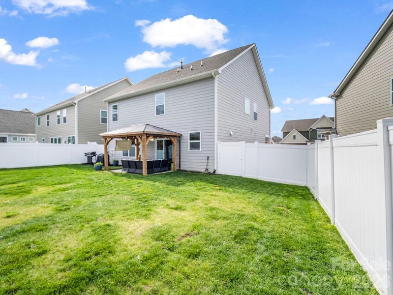 Exterior details and patio area of a home in , Hendersonville (Image 25).