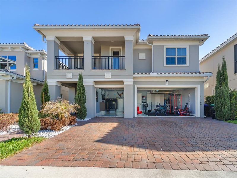 Front exterior of a new home in , Orlando, FL, highlighting curb appeal (Image 25).