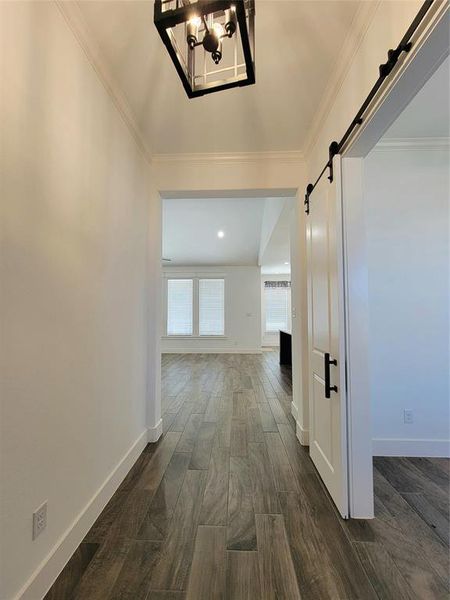 Unfurnished living room featuring vaulted ceiling with beams, ceiling fan, and dark wood-type flooring