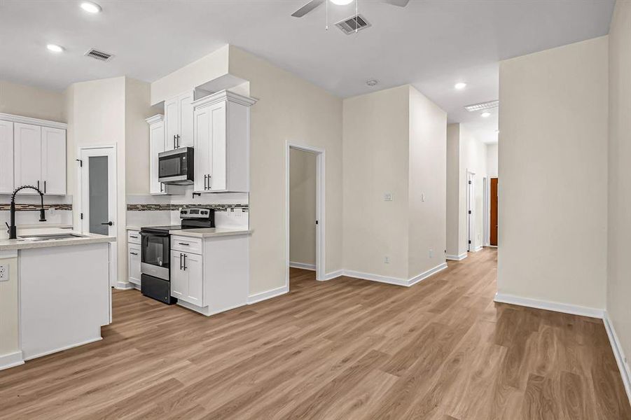 Looking toward the office and entry from the living room.