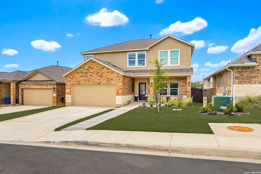 Front exterior of a new home in Hidden Trails, Bulverde, TX, highlighting curb appeal (Image 1). Front exterior of a new home in Hidden Trails, Bulverde, TX, highlighting curb appeal (Image 1).