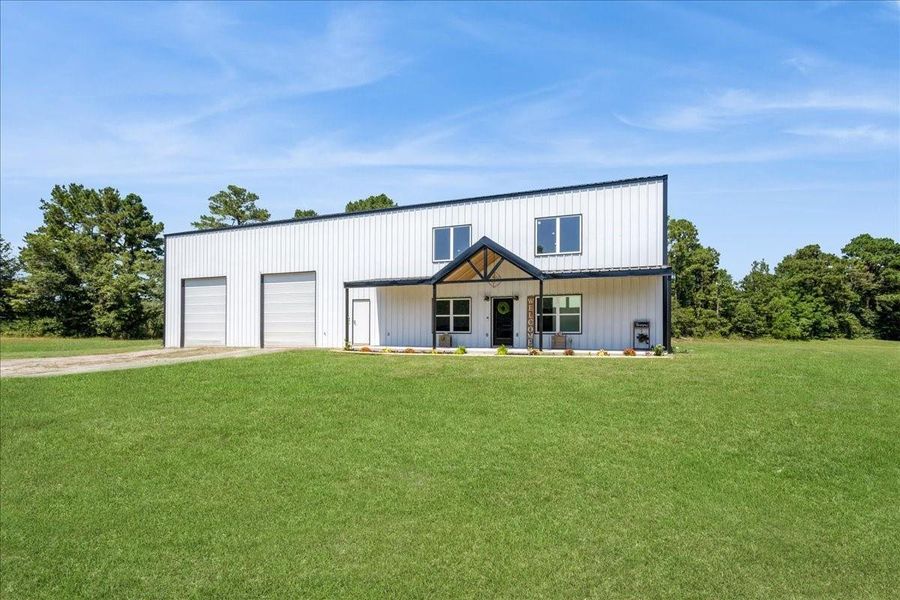 Front exterior of a new home in , Diboll, TX, highlighting curb appeal (Image 23). Front exterior of a new home in , Diboll, TX, highlighting curb appeal (Image 23).
