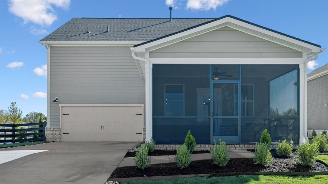 Front exterior of a new home in Harvest Point, Spring Hill, TN, highlighting curb appeal (Image 24). Front exterior of a new home in Harvest Point, Spring Hill, TN, highlighting curb appeal (Image 24).