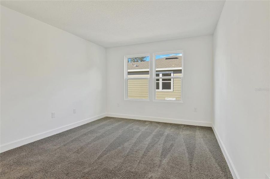 Spacious, unfurnished interior of a new home in Seasons at Wekiva Ridge, Mount Dora (Image 15).