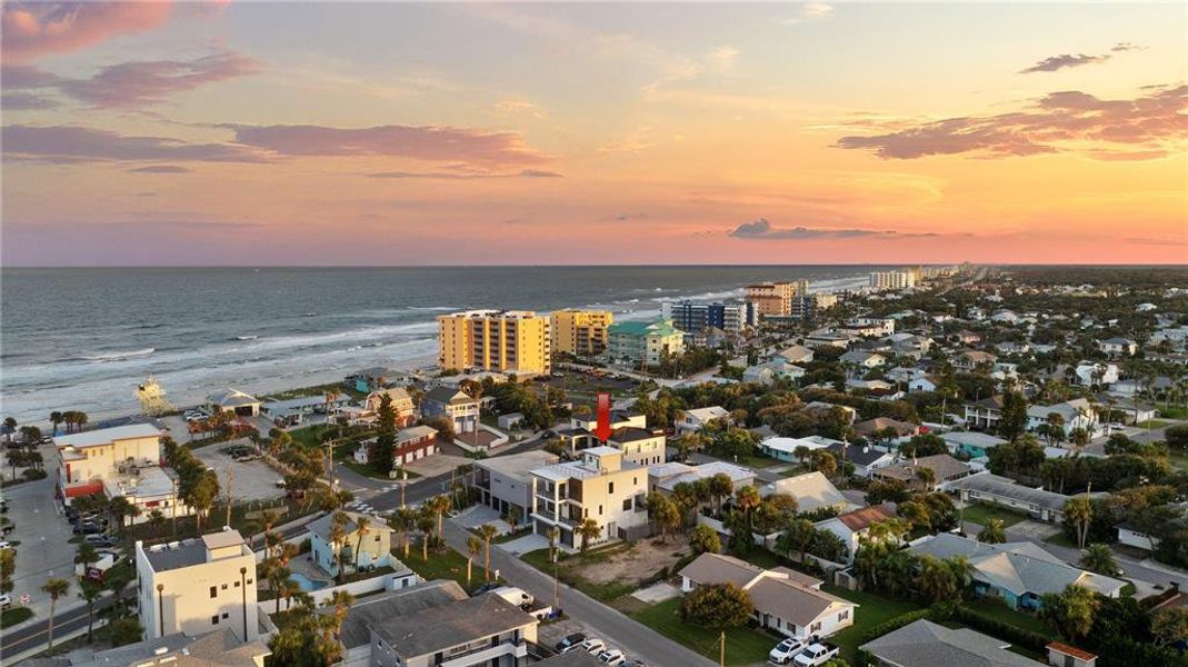 Front exterior of a new home in , New Smyrna Beach, FL, highlighting curb appeal (Image 1).
