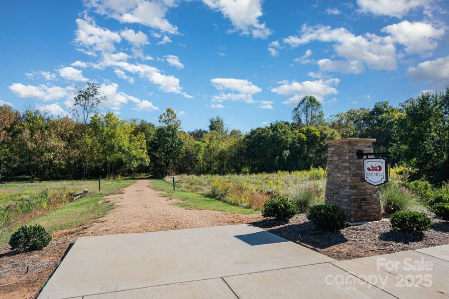 Neighborhood walking trail just steps away.
