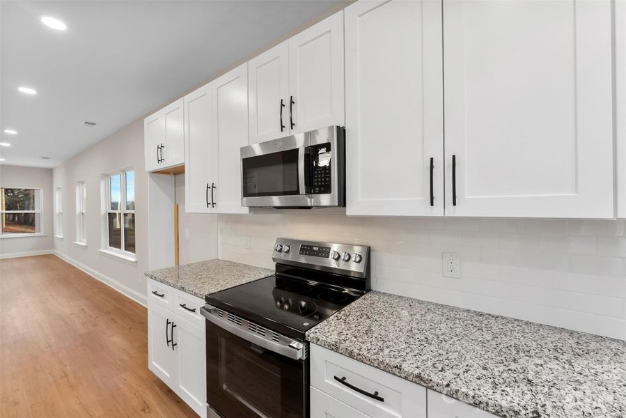 Furnished interior view inside a new home in , Hickory (Image 8).