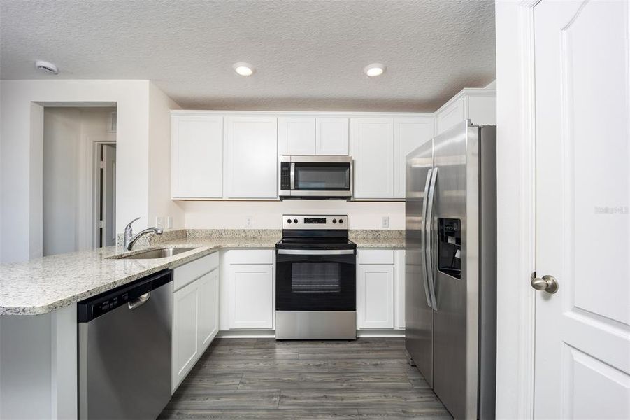 Furnished interior view inside a new home in Gum Lake Preserve, Lake Alfred (Image 6). Furnished interior view inside a new home in Gum Lake Preserve, Lake Alfred (Image 6).