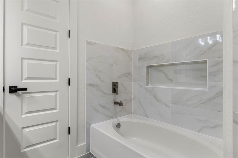 Bathroom featuring shower / tub combination Bathroom featuring shower / tub combination