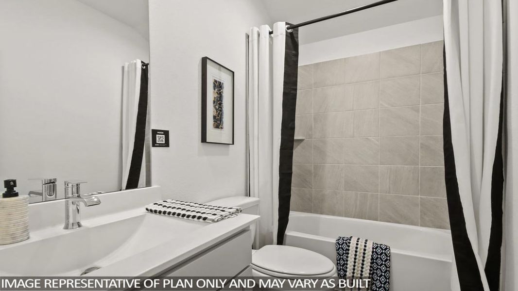 Furnished interior view inside a new home in East Williams Cove, Conroe (Image 11).