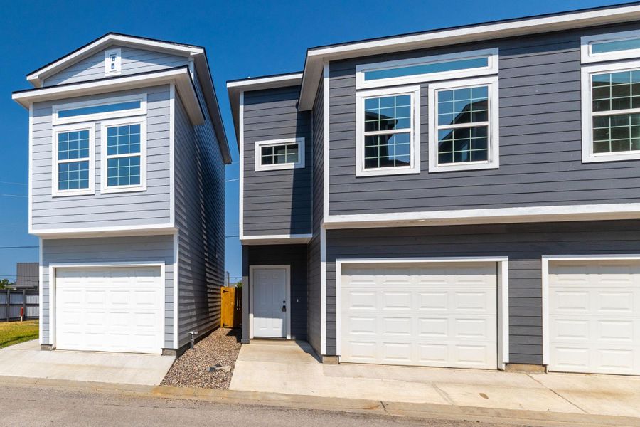 Front exterior of a new home in , Spring, TX, highlighting curb appeal (Image 17). Front exterior of a new home in , Spring, TX, highlighting curb appeal (Image 17).