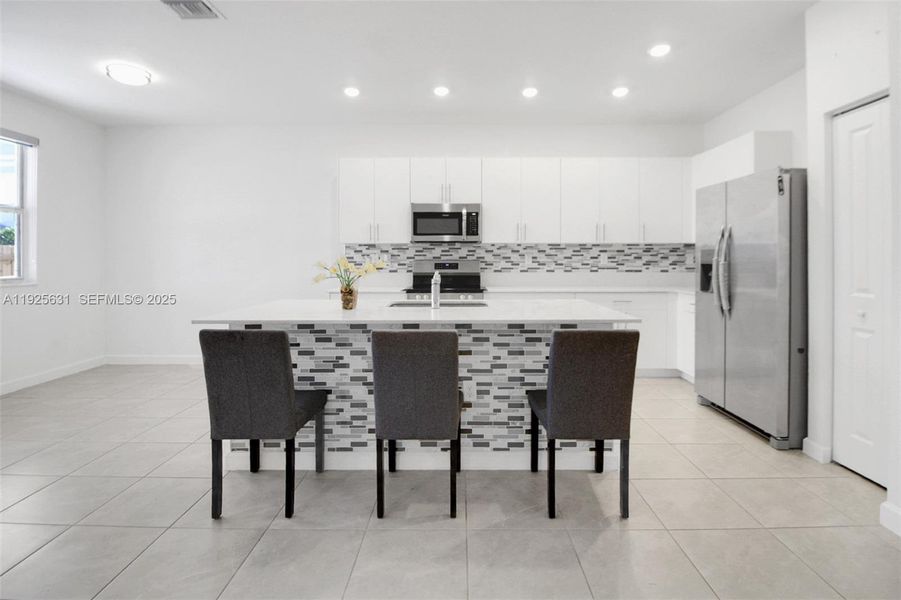 Furnished interior view inside a new home in , Homestead (Image 15). Furnished interior view inside a new home in , Homestead (Image 15).