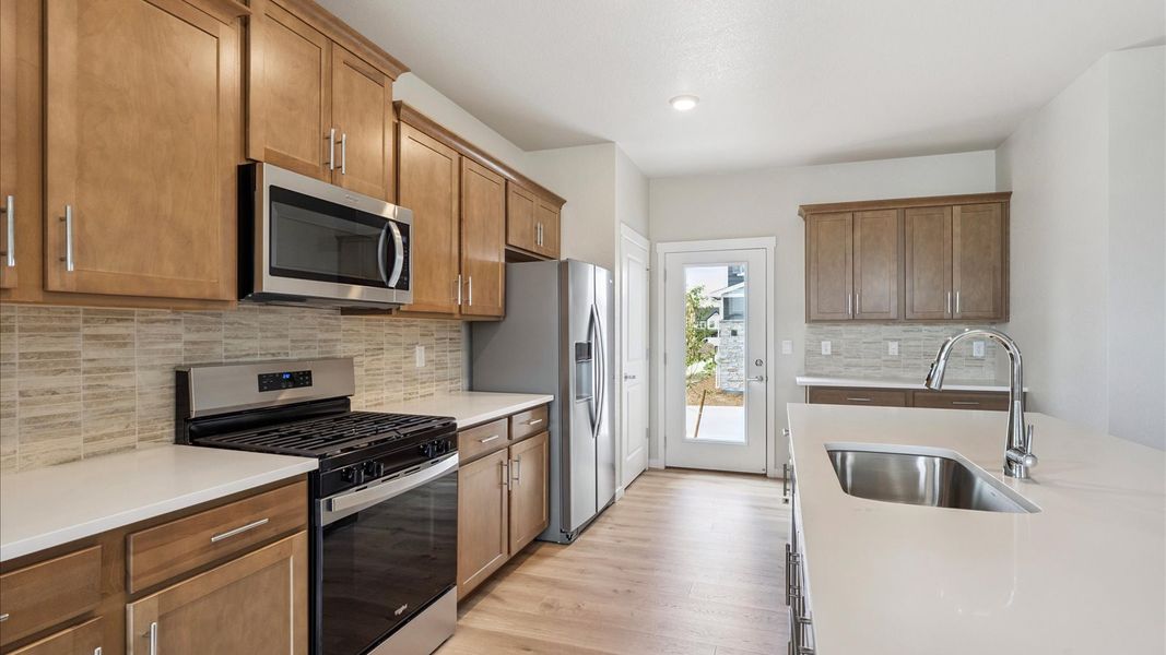 Furnished interior view inside a new home in Sky Ranch, Watkins (Image 6).