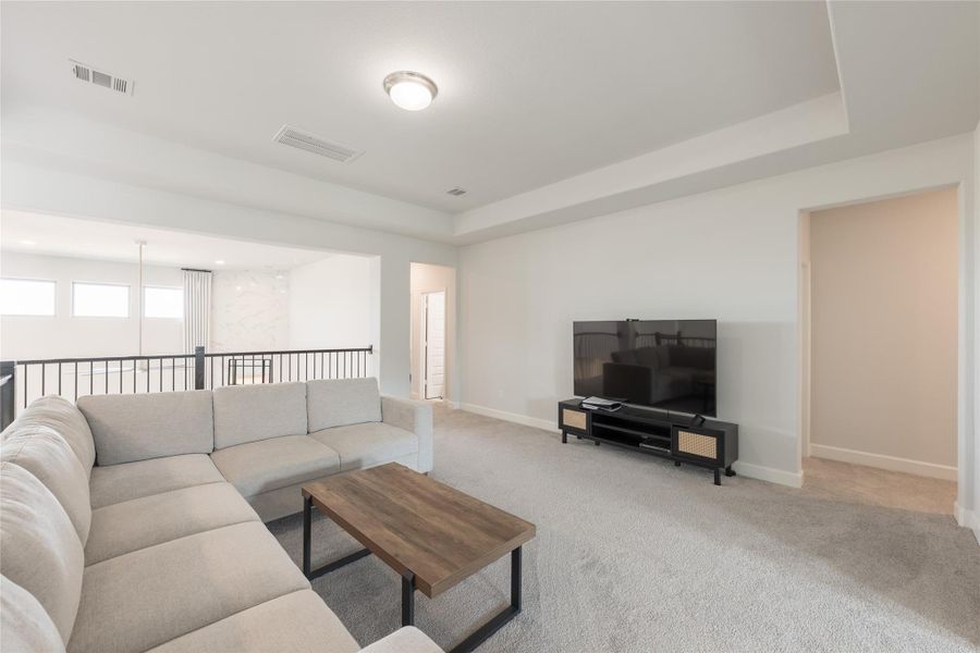 Furnished interior view inside a new home in Elyson, Katy (Image 36).