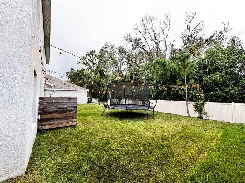 Exterior details and patio area of a home in , Zephyrhills (Image 3).