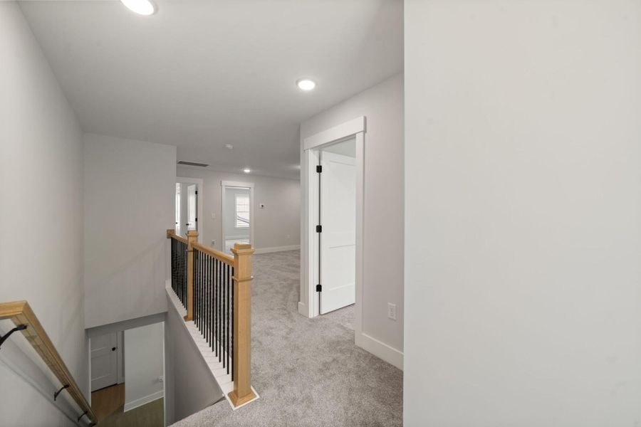 Spacious, unfurnished interior of a new home in Fiddler's Ridge, Advance (Image 19).