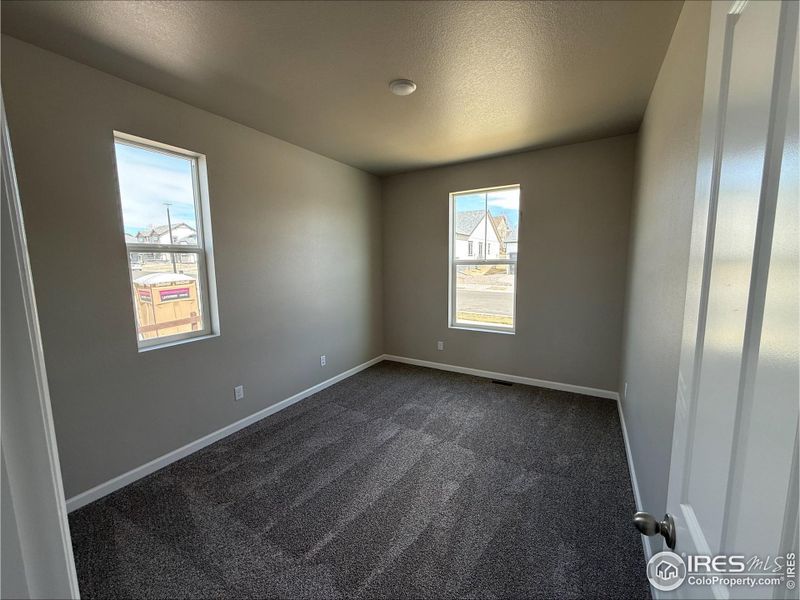 Spacious, unfurnished interior of a new home in Highlands Preserve, Mead (Image 7).