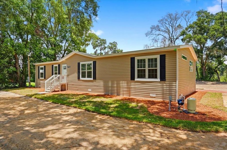Exterior details and patio area of a home in , Zephyrhills (Image 26).