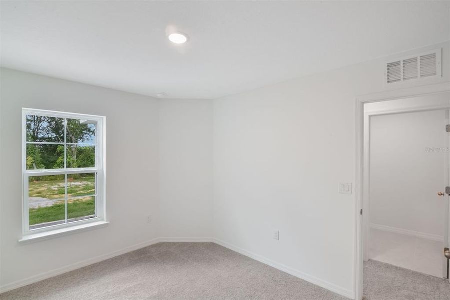 Spacious, unfurnished interior of a new home in Delaney Reserve, Deland (Image 59).