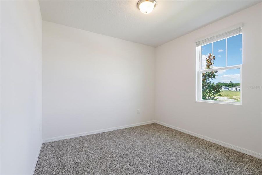 Spacious, unfurnished interior of a new home in Bradbury Creek - Signature Series, Haines City (Image 25).