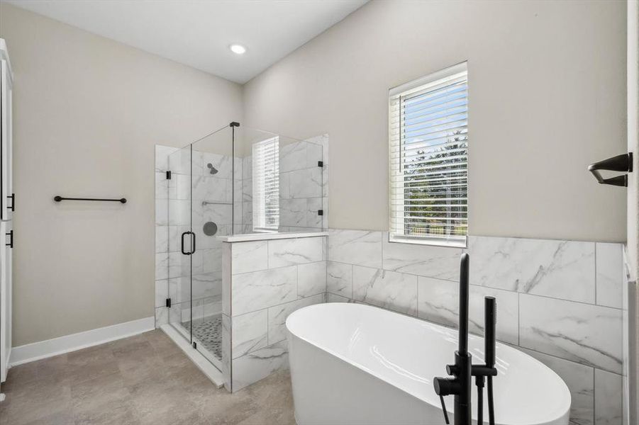 Bathroom with independent shower and bath