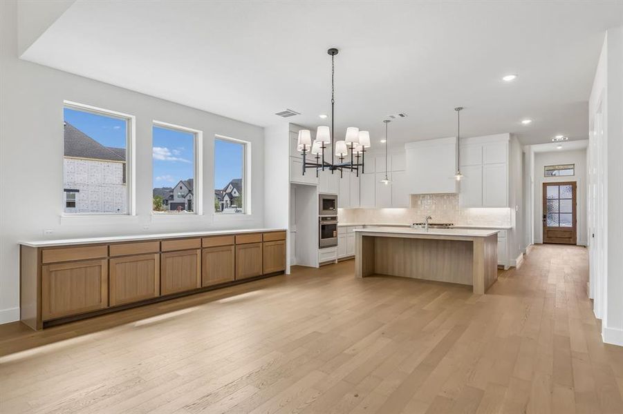 Featuring built in cabinets and a wall of windows in the dining room, you'll find entertaining is a breeze in this outstanding floor plan! Featuring built in cabinets and a wall of windows in the dining room, you'll find entertaining is a breeze in this outstanding floor plan!